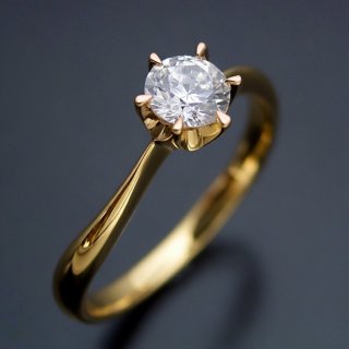 １８金０.３カラット。新しい王道デザインで満足！：鹿児島県・Nさま・30代女性（購入商品：0.3カラット版：アームデザインが新しいティファニーセッティングの婚約指輪 [BE59-03]）