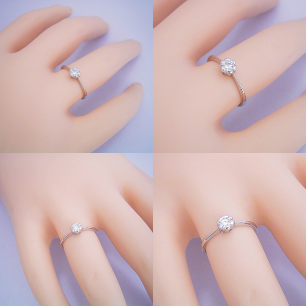 ダイヤモンドを優しく包むフラワーモチーフの婚約指輪